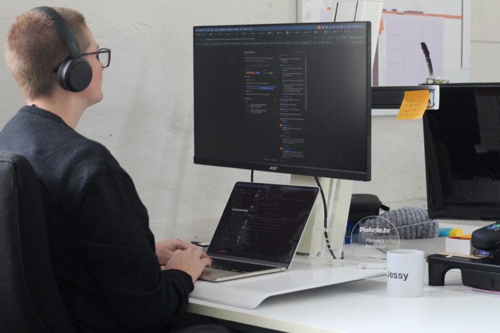 Jessy, Head of Production at Piehole.TV, manages AI-ready video production on a project dashboard, building transcripts and supporting content that help AI search understand video.